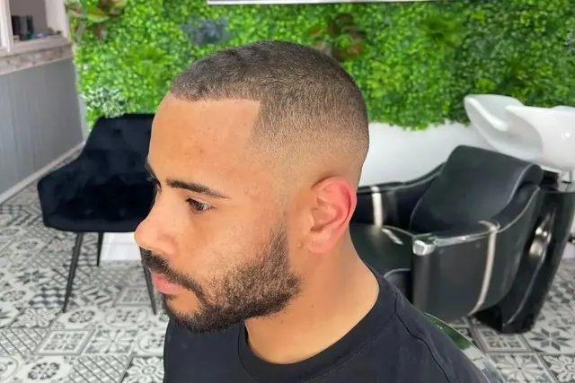 A crop and beard line-up at Urban Cuts